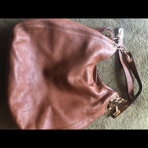 Michael Kors brown leather boho style bag.